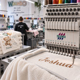 Personalisierung einer Babydecke mit Stickmaschine von wolimbo