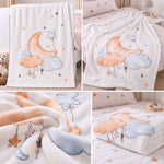 Detailansichten der Babydecke mit Mond, Wolken und Sternen