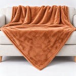 cashmere-feeling Wohndecke sand-farbig auf dem Sofa ohne Bestickung