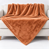 cashmere-feeling Wohndecke sand-farbig auf dem Sofa ohne Bestickung