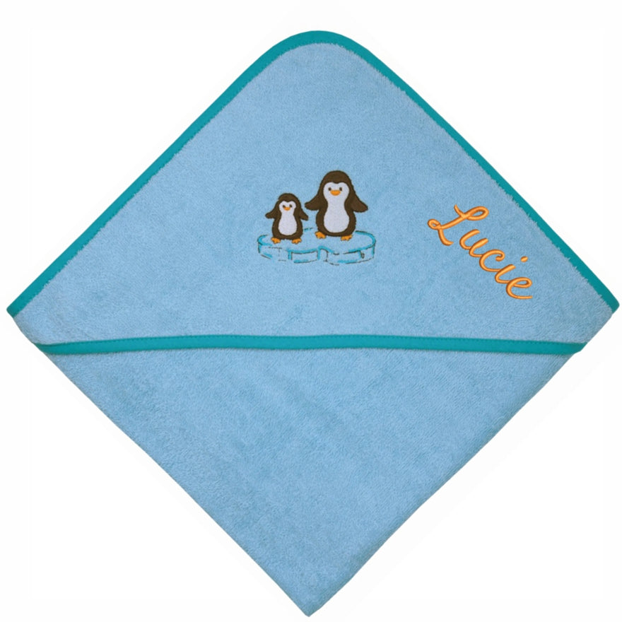 Kapuze des blauen Kapuzenhandtuchs mit zwei Pinguinen und gesticktem Namen Lucie
