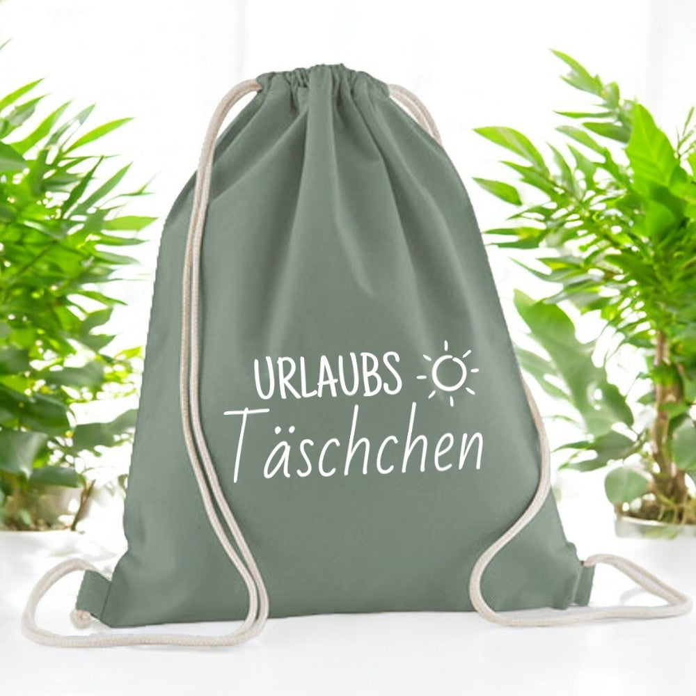 Geschenkbeutel für personalisierte Handtücher und Babydecken von wolimbo im Farbton dusty-green