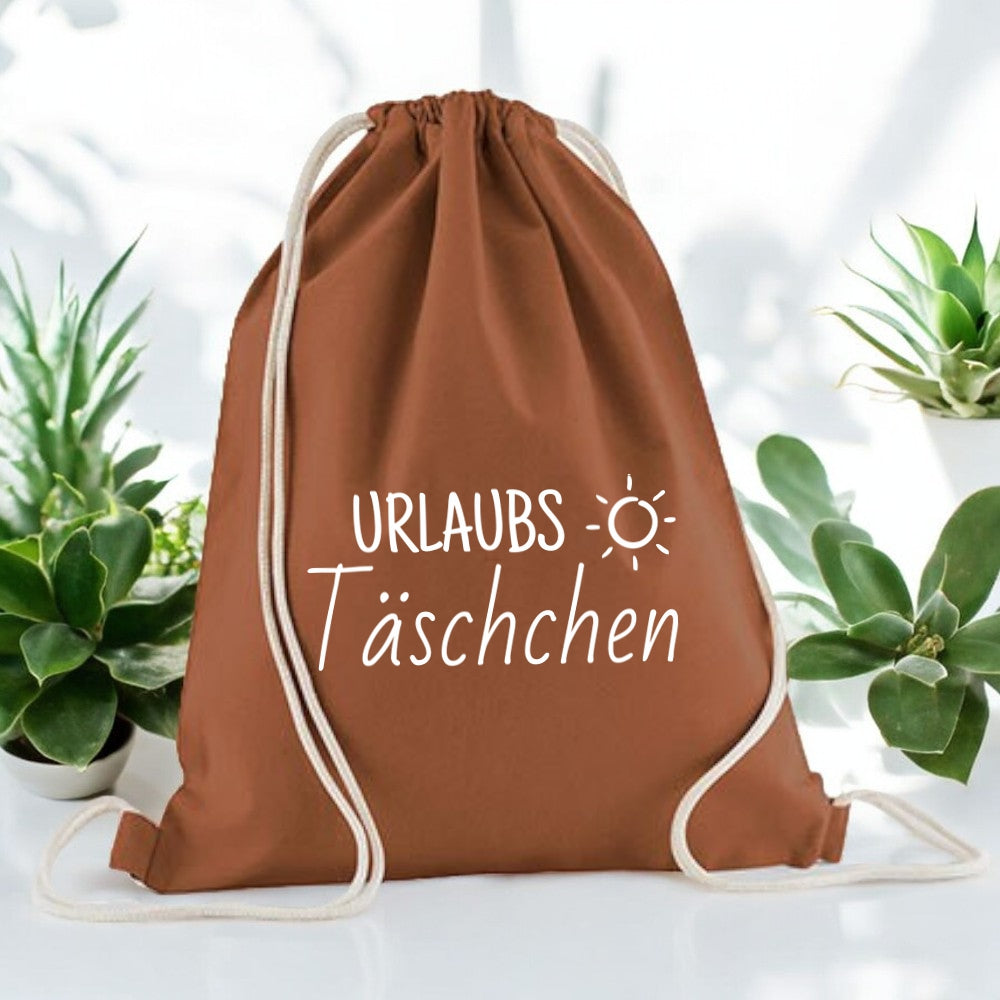 Geschenkbeutel für personalisierte Handtücher und Babydecken von wolimbo im Farbton terracotta