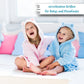 2 Kinder lachen mit Bademantel