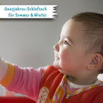 Baby mit Schlafsack bestickt von Wolimbo