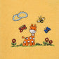 Detailansicht Poncho mit Namen bestickt Giraffe Motiv